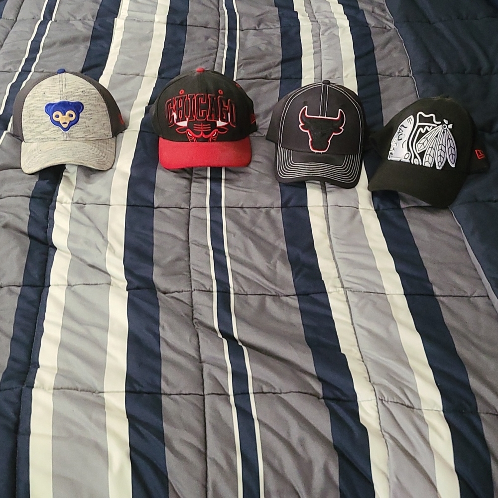 3 new era hats and 1 Adidas hat